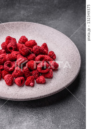 Dried sublimated slices of raspberry as an ingredient for sweet desserts. Dried raspberry Dried sublimated slices of raspberry as an ingredient for sweet desserts. Dried raspberry 132349375