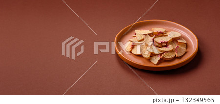 Dried sublimated slices of peach or apricot as an ingredient for sweet desserts. Dried peach Dried sublimated slices of peach or apricot as an ingredient for sweet desserts. Dried peach 132349565