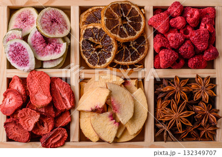 Box of dried fruits strawberries, raspberries, figs and peaches. Dried fruits 132349707