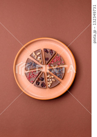 Craft home made chocolate with berries and fruits, delicious sweets. Craft chocolate Craft home made chocolate with berries and fruits, delicious sweets. Craft chocolate 132349731