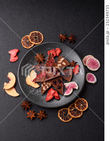 Craft home made chocolate with berries and fruits, delicious sweets. Craft chocolate 132349735