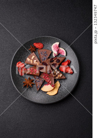 Craft home made chocolate with berries and fruits, delicious sweets. Craft chocolate 132349747