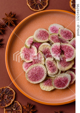 Dried sublimated fig slices as an ingredient for sweet desserts. Dried figs 132349796