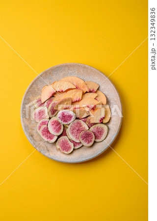 Dried sublimated fig and peach slices as an ingredient for desserts. Dried figs and peaches 132349836
