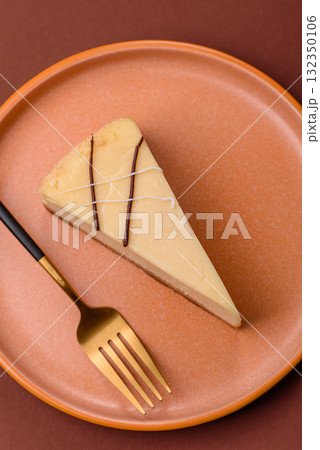 A piece of sweet New York cheesecake, dessert, cheese and vanilla pie. Classic cheesecake 132350106