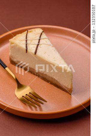 A piece of sweet New York cheesecake, dessert, cheese and vanilla pie. Classic cheesecake 132350107