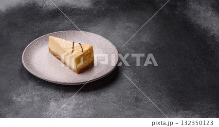 A piece of sweet New York cheesecake, dessert, cheese and vanilla pie. Classic cheesecake 132350123