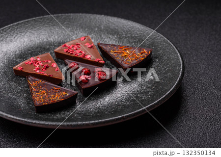 Craft home made chocolate with berries and fruits, delicious sweets. Craft chocolate Craft home made chocolate with berries and fruits, delicious sweets. Craft chocolate 132350134