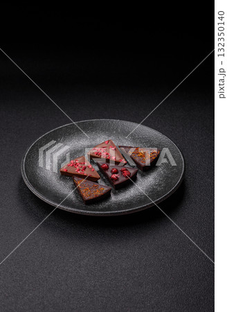 Craft home made chocolate with berries and fruits, delicious sweets. Craft chocolate Craft home made chocolate with berries and fruits, delicious sweets. Craft chocolate 132350140