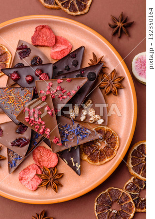 Craft home made chocolate with berries and fruits, delicious sweets. Craft chocolate Craft home made chocolate with berries and fruits, delicious sweets. Craft chocolate 132350164