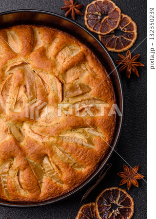 Apple or pear sweet pie for Halloween, hot baking in autumn. Apple pie Apple or pear sweet pie for Halloween, hot baking in autumn. Apple pie 132350239