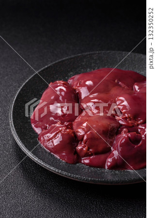 Raw fresh chicken or turkey liver, internal offal of poultry. Raw chicken liver 132350252