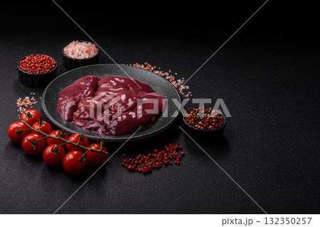 Raw fresh chicken or turkey liver, internal offal of poultry. Raw chicken liver 132350257