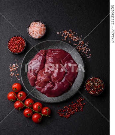 Raw fresh chicken or turkey liver, internal offal of poultry. Raw chicken liver 132350259