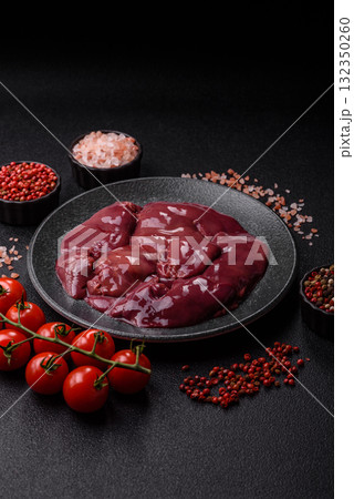 Raw fresh chicken or turkey liver, internal offal of poultry. Raw chicken liver Raw fresh chicken or turkey liver, internal offal of poultry. Raw chicken liver 132350260