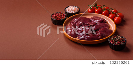 Raw fresh chicken or turkey liver, internal offal of poultry. Raw chicken liver Raw fresh chicken or turkey liver, internal offal of poultry. Raw chicken liver 132350261