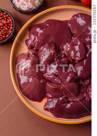 Raw fresh chicken or turkey liver, internal offal of poultry. Raw chicken liver Raw fresh chicken or turkey liver, internal offal of poultry. Raw chicken liver 132350267