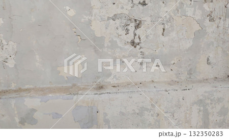 Damp stains and cracked paint on white wall from moisture leakage Damp stains and cracked paint on white wall from moisture leakage 132350283