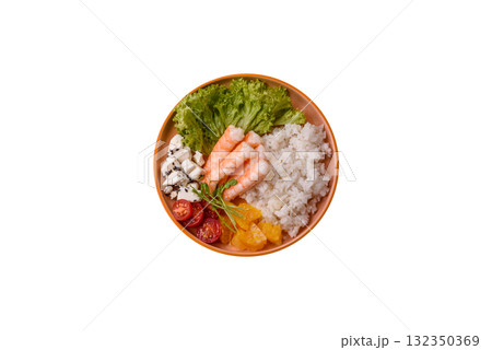Bowl with shrimps, seafood, rice, oranges, tomatoes with sauce. Bowl with prawns Bowl with shrimps, seafood, rice, oranges, tomatoes with sauce. Bowl with prawns 132350369