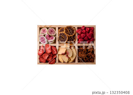 Box of dried fruits strawberries, raspberries, figs and peaches. Dried fruits Box of dried fruits strawberries, raspberries, figs and peaches. Dried fruits 132350408