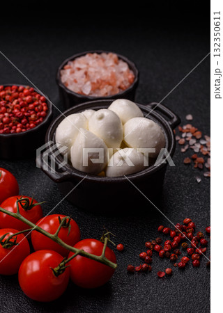 Mozzarella cheese balls, fresh white mini slices for Mediterranean food. Mozzarella cheese Mozzarella cheese balls, fresh white mini slices for Mediterranean food. Mozzarella cheese 132350611