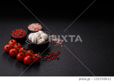 Mozzarella cheese balls, fresh white mini slices for Mediterranean food. Mozzarella cheese Mozzarella cheese balls, fresh white mini slices for Mediterranean food. Mozzarella cheese 132350612