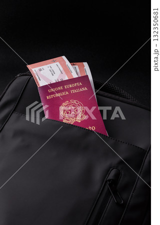 Italy passport, visa for travel, document with tickets in travel bag. Italian passport Italy passport, visa for travel, document with tickets in travel bag. Italian passport 132350681