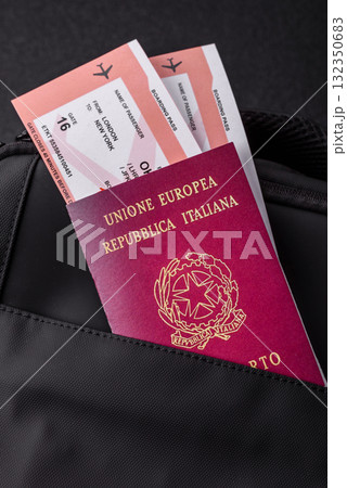 Italy passport, visa for travel, document with tickets in travel bag. Italian passport Italy passport, visa for travel, document with tickets in travel bag. Italian passport 132350683