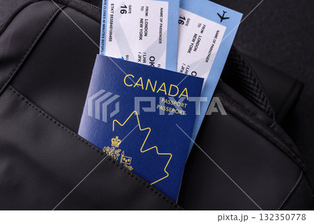 Passport Canada, visa for travel, document with tickets in travel bag. Canadian passport 132350778
