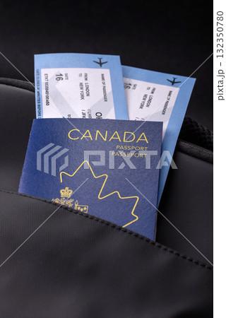 Passport Canada, visa for travel, document with tickets in travel bag. Canadian passport 132350780