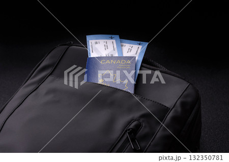 Passport Canada, visa for travel, document with tickets in travel bag. Canadian passport Passport Canada, visa for travel, document with tickets in travel bag. Canadian passport 132350781
