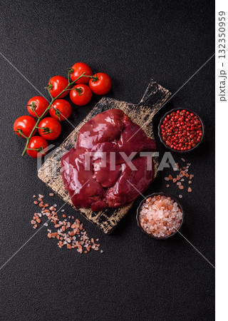 Raw fresh chicken or turkey liver, internal offal of poultry. Raw chicken liver Raw fresh chicken or turkey liver, internal offal of poultry. Raw chicken liver 132350959