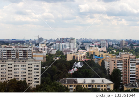 Cityscape View with Modern Architecture Amidst Cloudy Skies Cityscape View with Modern Architecture Amidst Cloudy Skies 132351044