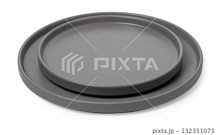 Stacked grey ceramic plates for modern minimalist tableware Stacked grey ceramic plates for modern minimalist tableware 132351073