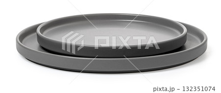 Stacked grey ceramic plates for modern minimalist tableware Stacked grey ceramic plates for modern minimalist tableware 132351074