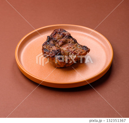 Pork breast steak, grilled fillet, healthy food, lunch. Pork steak as food background Pork breast steak, grilled fillet, healthy food, lunch. Pork steak as food background 132351367