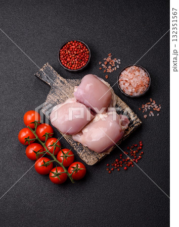 Chicken or turkey raw thigh fillet, skinless and boneless poultry meat. Chicken thigh fillet Chicken or turkey raw thigh fillet, skinless and boneless poultry meat. Chicken thigh fillet 132351567