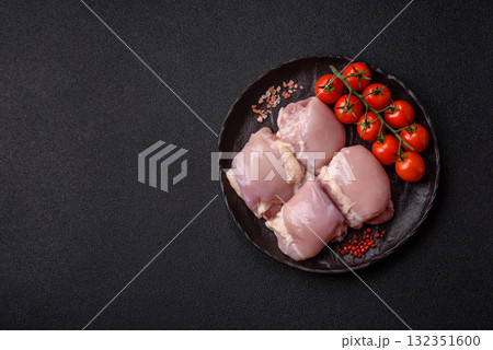 Chicken or turkey raw thigh fillet, skinless and boneless poultry meat. Chicken thigh fillet Chicken or turkey raw thigh fillet, skinless and boneless poultry meat. Chicken thigh fillet 132351600