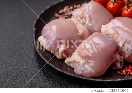 Chicken or turkey raw thigh fillet, skinless and boneless poultry meat. Chicken thigh fillet 132351603