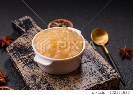 Apple sweet sauce, baby food, canned ingredient for desserts. Apple sauce 132351680