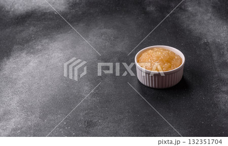 Apple sweet sauce, baby food, canned ingredient for desserts. Apple sauce 132351704