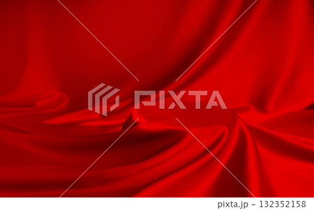 Vibrant red silk with rich folds and glossy drape forming a festive podium. Luxury background for jewelry, perfume, gifts and christmas promotions. 132352158