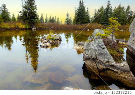 Peaceful waters of little lake in mountains in the autumn. 132352219