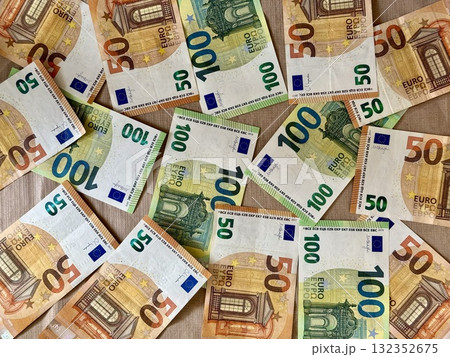 Finance background of Euro banknotes. European money, top view, flat lay. Concept of money, finance, European currency, cash and wealth Finance background of Euro banknotes. European money, top view, flat lay. Concept of money, finance, European currency, cash and wealth 132352675