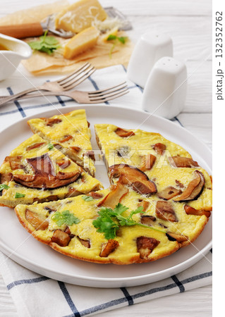 tasty porcini mushroom parmesan omelette, top view tasty porcini mushroom parmesan omelette, top view 132352762