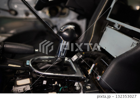 This luxury car interior showcases an elegant design complete with an automatic gear shift feature 132353027