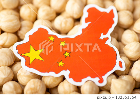 Flag and map of China on hazelnuts. Agrobusiness of growing hazelnuts in China, origin of hazelnuts 132353554