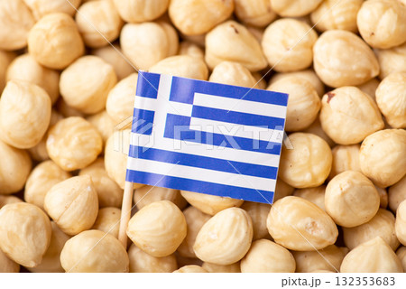 Flag of Greece on hazelnuts. Agrobusiness of growing hazelnuts in Greece Flag of Greece on hazelnuts. Agrobusiness of growing hazelnuts in Greece 132353683