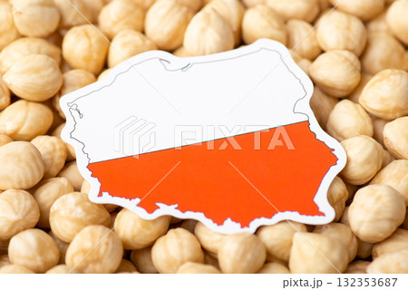 Flag and map of Poland on hazelnut. Concept of growing hazelnuts in Poland, origin of nuts 132353687