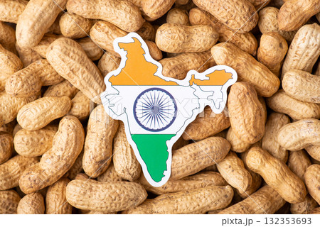 Flag and map of India on peanut. Growing peanut in India, origin of nuts Flag and map of India on peanut. Growing peanut in India, origin of nuts 132353693